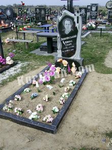 СТ-11: Памятник с резьбой 'Свеча, огонь и крестик с полотенцем' Памятник с резьбой свечи, огнем и крестом